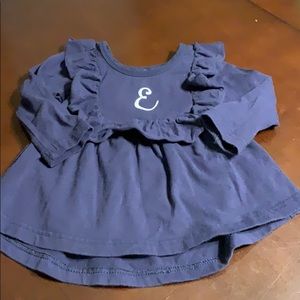 Navy E ruffle top